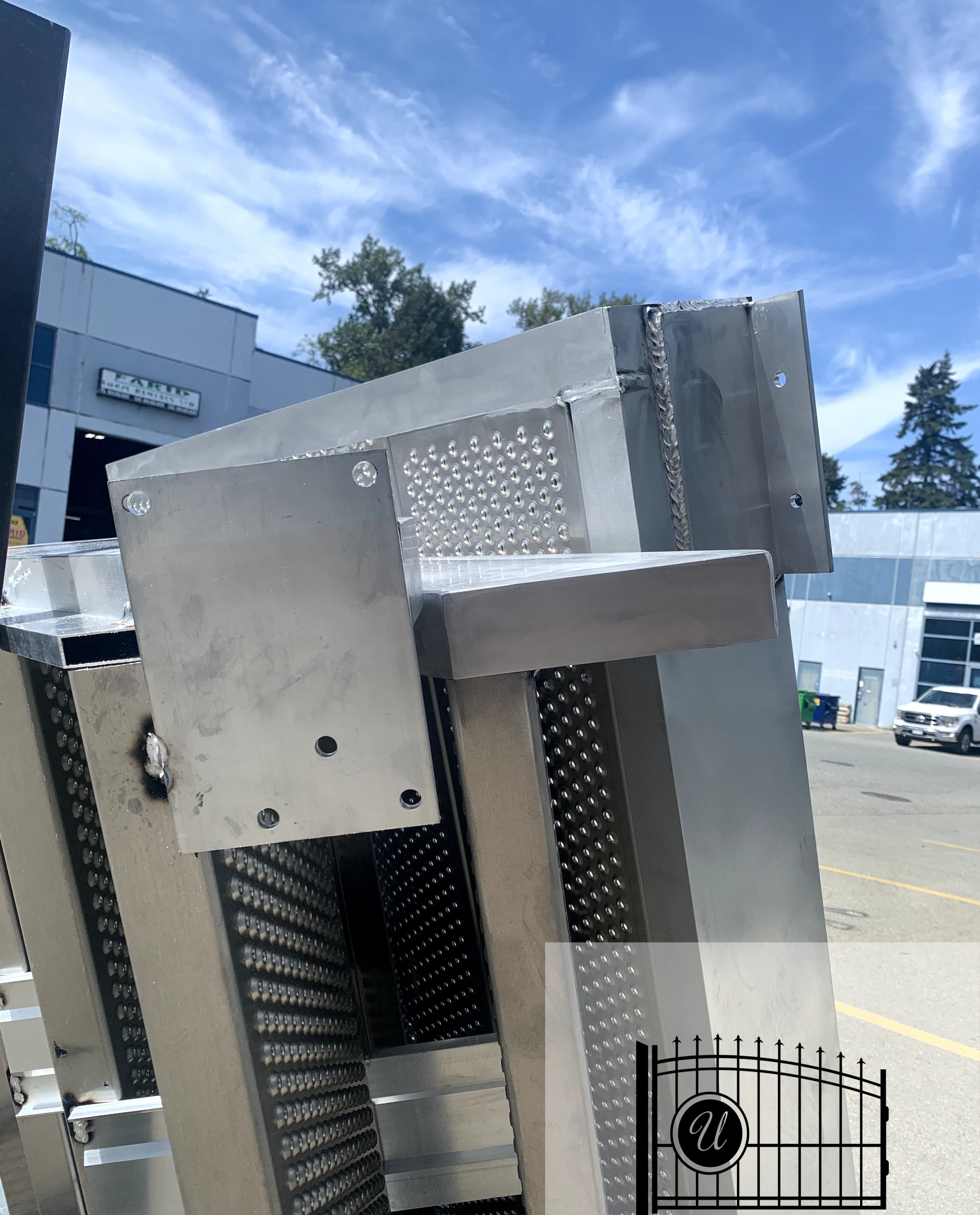 Welded aluminum grated stair structure fabricated in-house